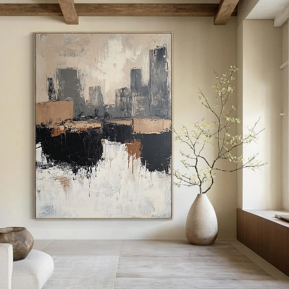 Large abstract painting featuring beige and white tones with gray and brown accents depicting rocks and a cityscape in a minimalist style.STSC412