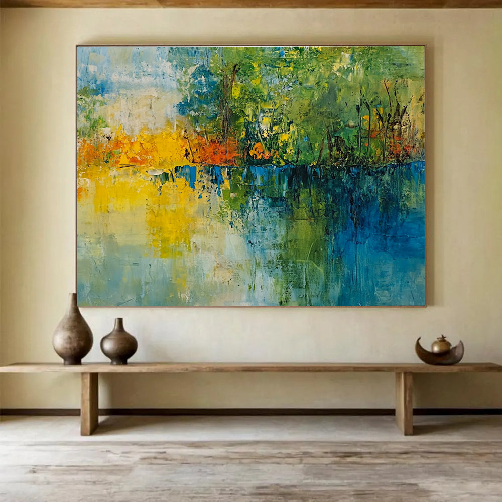 A large abstract painting featuring a vibrant landscape with trees a lake and a colorful sky perfect for home decor.SC519