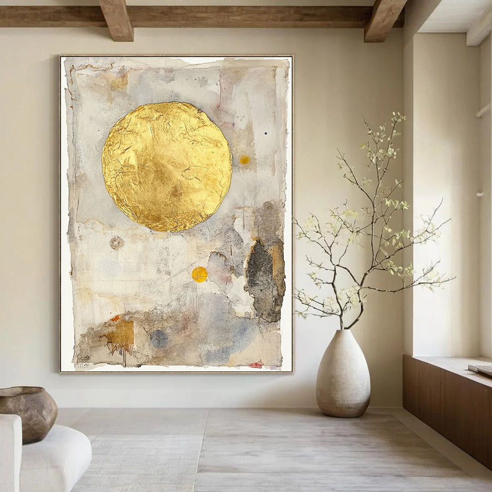Abstract painting of a golden sun on vintage paper with gold leafing and soft pastel watercolor washes in a minimalist style.STSC286