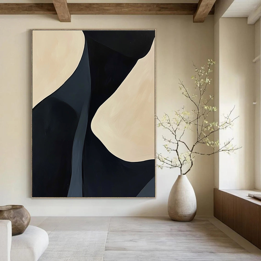 A large abstract painting featuring black and cream feminine curves with organic lines creating a calming effect on a light background.STSC609