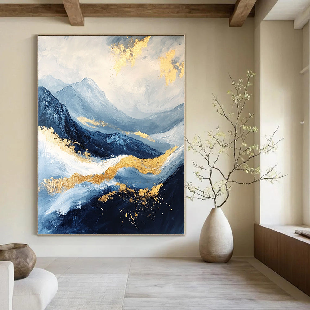 Abstract Blue and Gold Mountain Landscape Painting featuring a white sky, golden waves, dark blue clouds, and black rocks beautifully detailed.STSC030