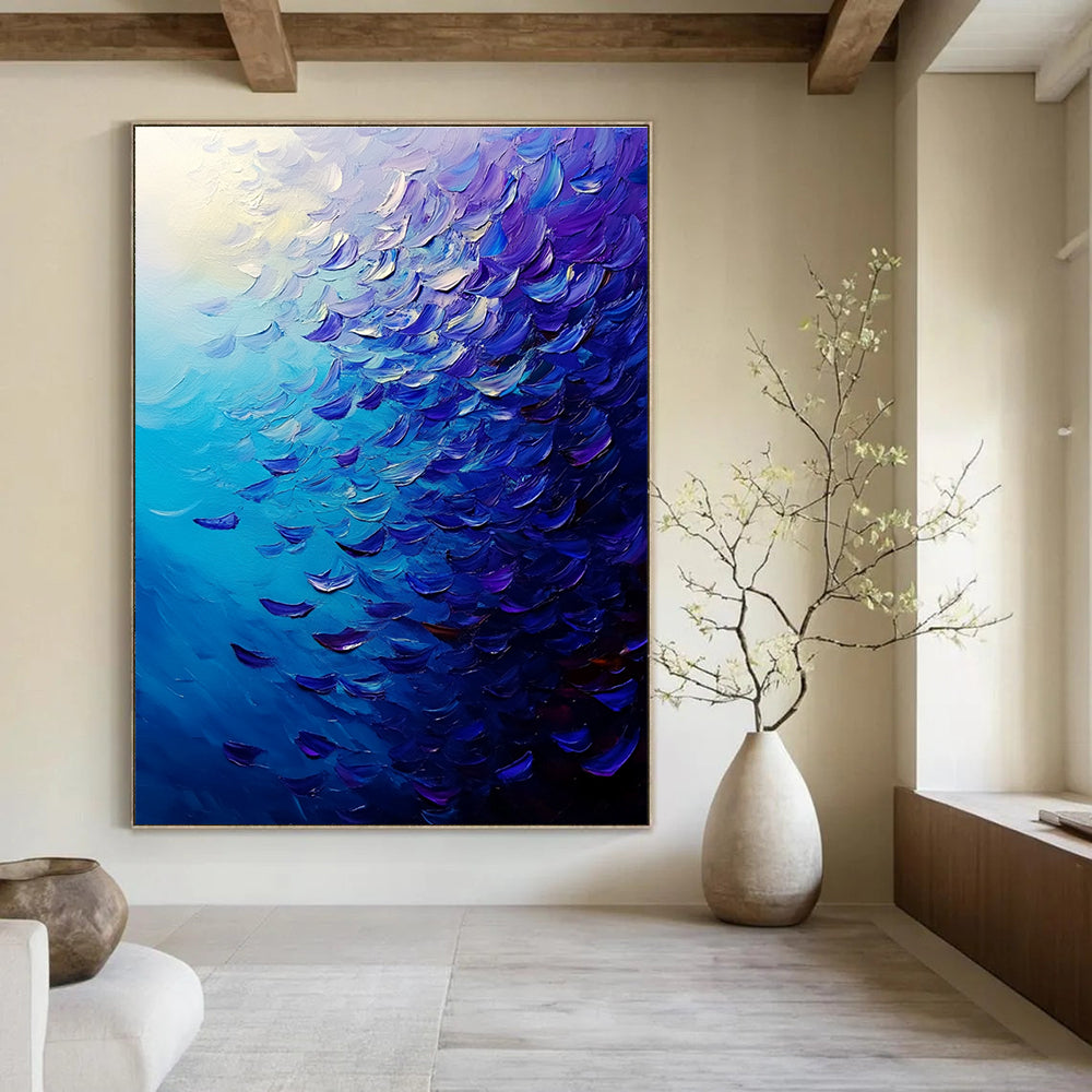 Large abstract painting of a vibrant ocean filled with fish in deep blue and purple hues featuring dynamic brush strokes and rich impasto texture.STSC866