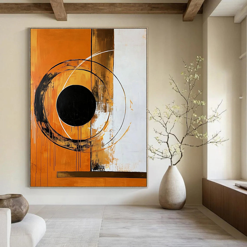 Large abstract painting featuring bold circular shapes and a black circle on an orange background with a brown border.STSC1354