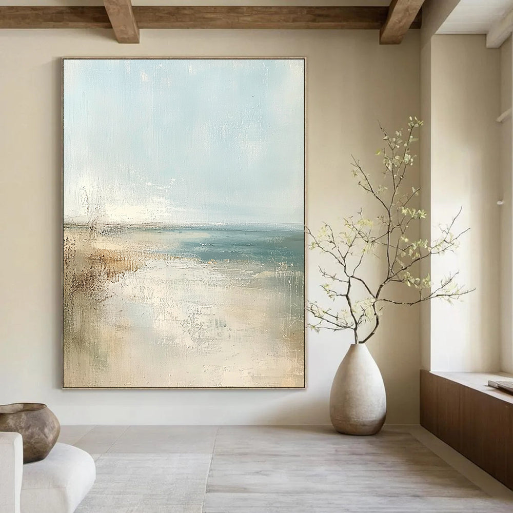 Large abstract painting of a beach in soft pastel colors featuring a light blue sky and neutral tones for a serene atmosphere.STSC158