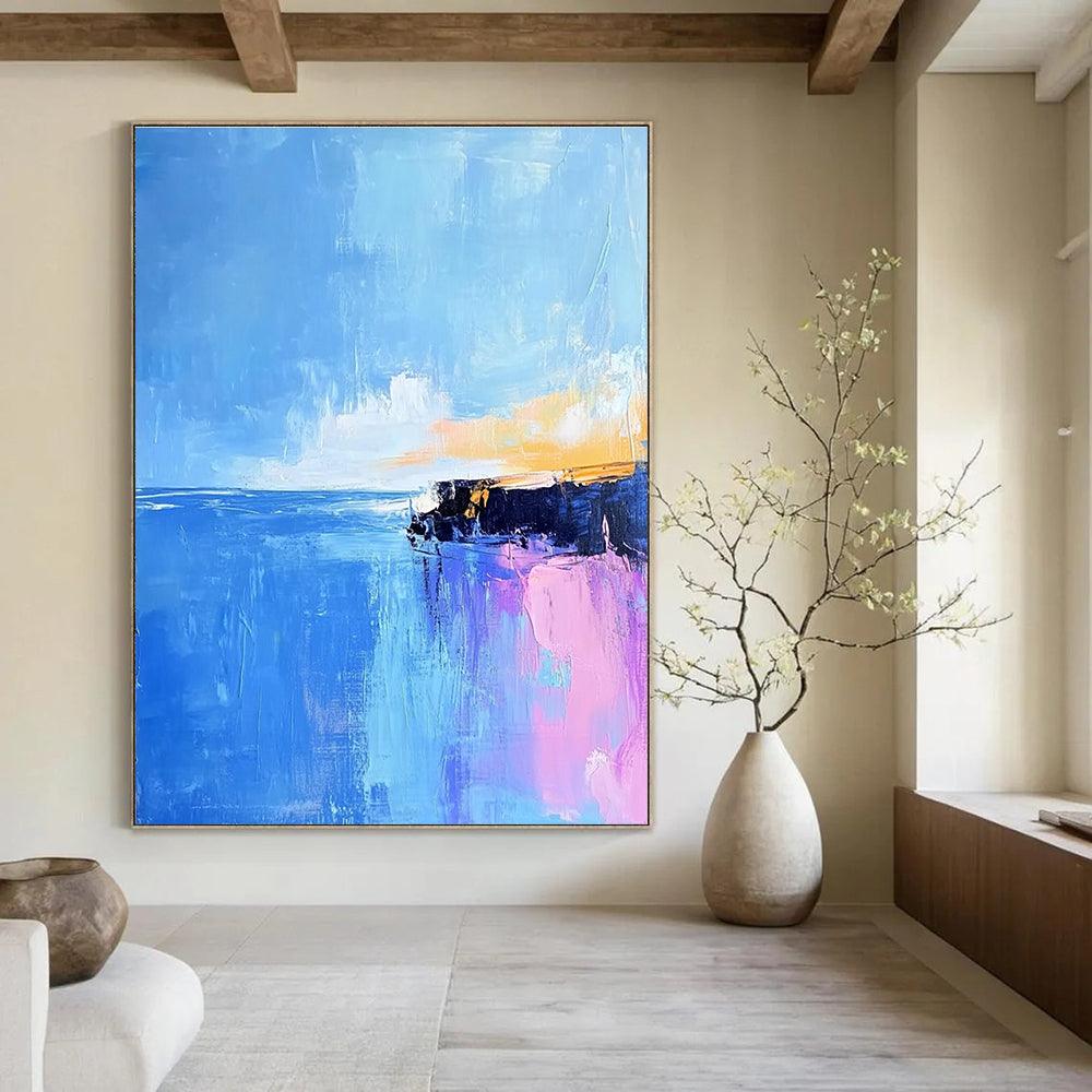 Large abstract painting of Pointe du Hoc's rocky coast in light pink and baby-blue hues with long brush strokes against a vibrant blue sky.STSC598
