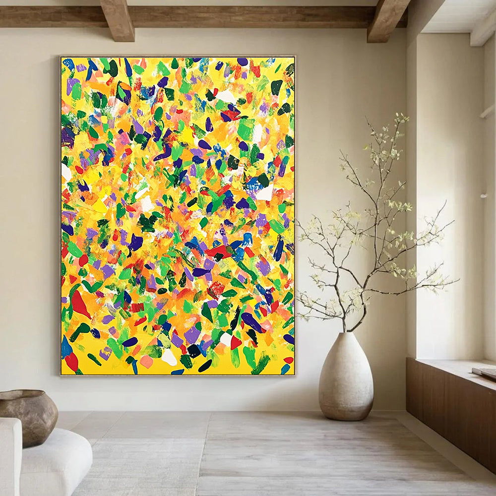 Large abstract painting with a yellow background and colorful confetti in joyful patterns, oil on canvas from the My Caverns series.STSC1269