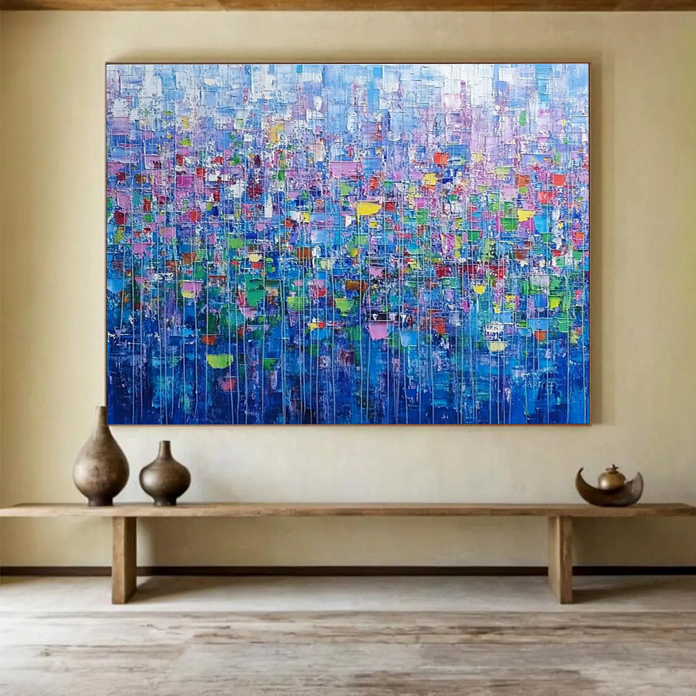 Large abstract painting of an urban landscape created with colorful squares and lines resembling small flowers in vibrant shades.SC474