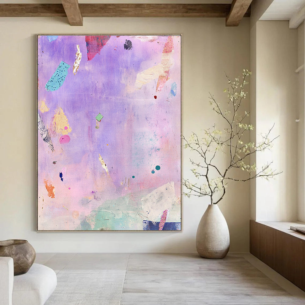 A large abstract painting featuring whimsical floating objects in lavender and pink with vintage fabric pieces and a serene dynamic composition that evokes joy.STSC1207