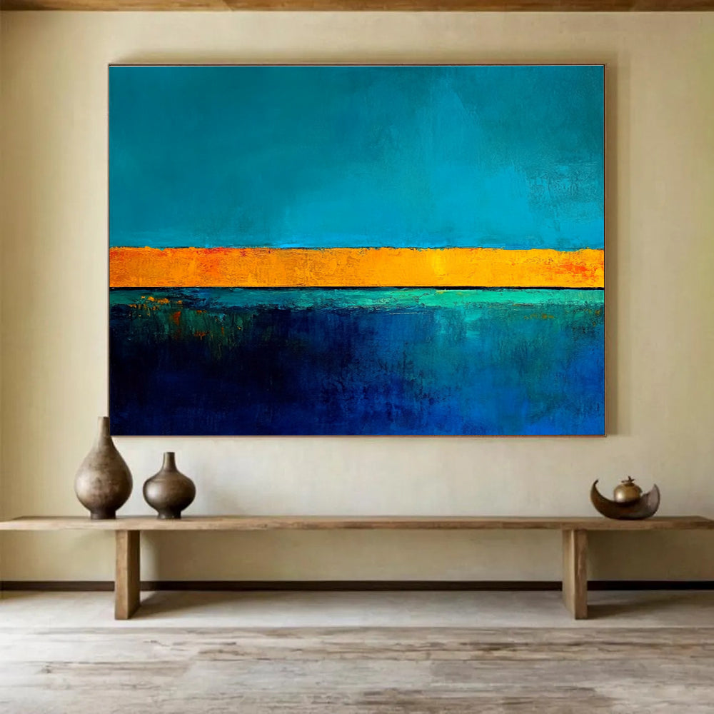 Large abstract painting featuring bold blue and yellow contrasts with a tranquil turquoise base and gold lines inspiring serenity and calmness.SC492