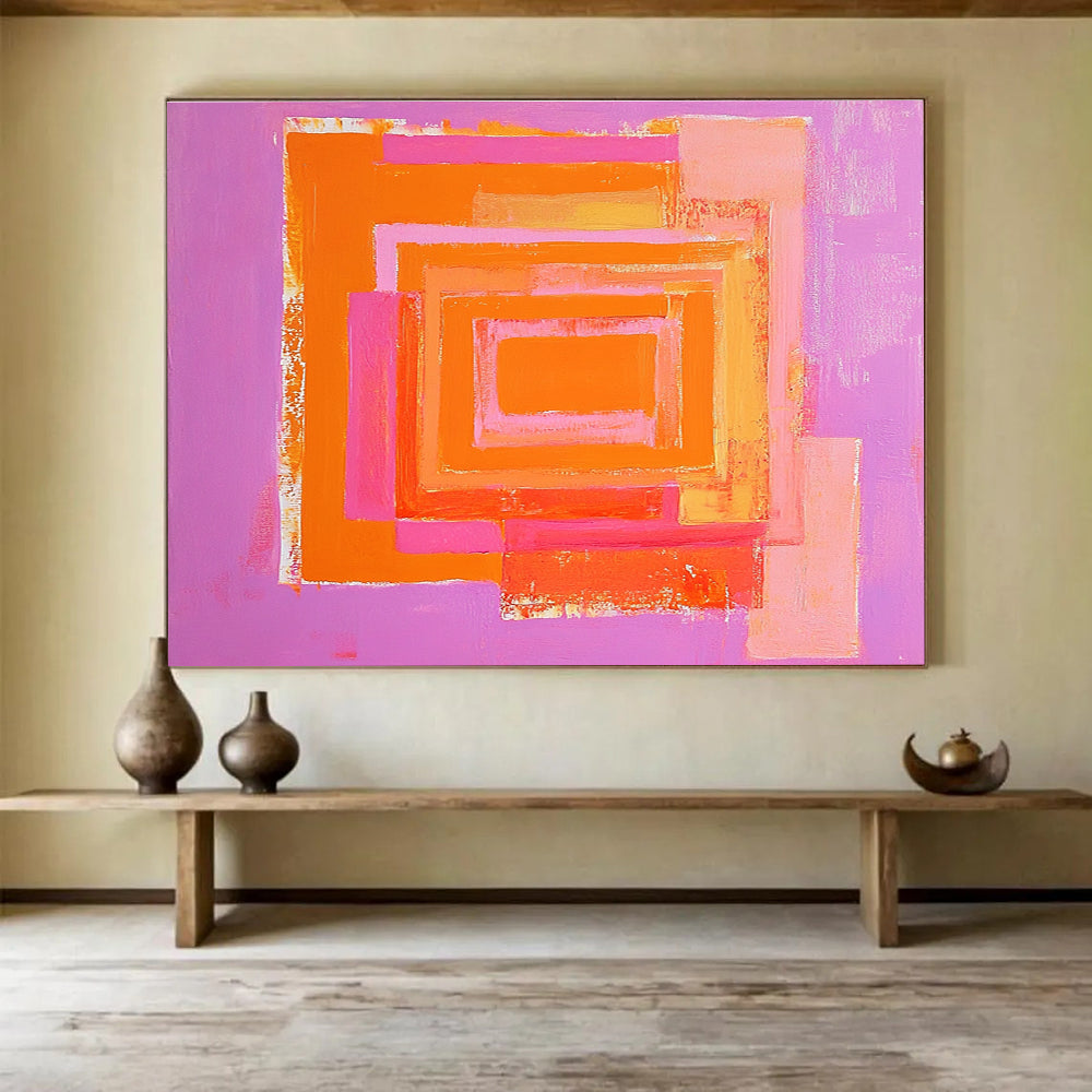 A large abstract painting featuring a pink and orange pastel maze with bold shapes and ample negative space.SC539