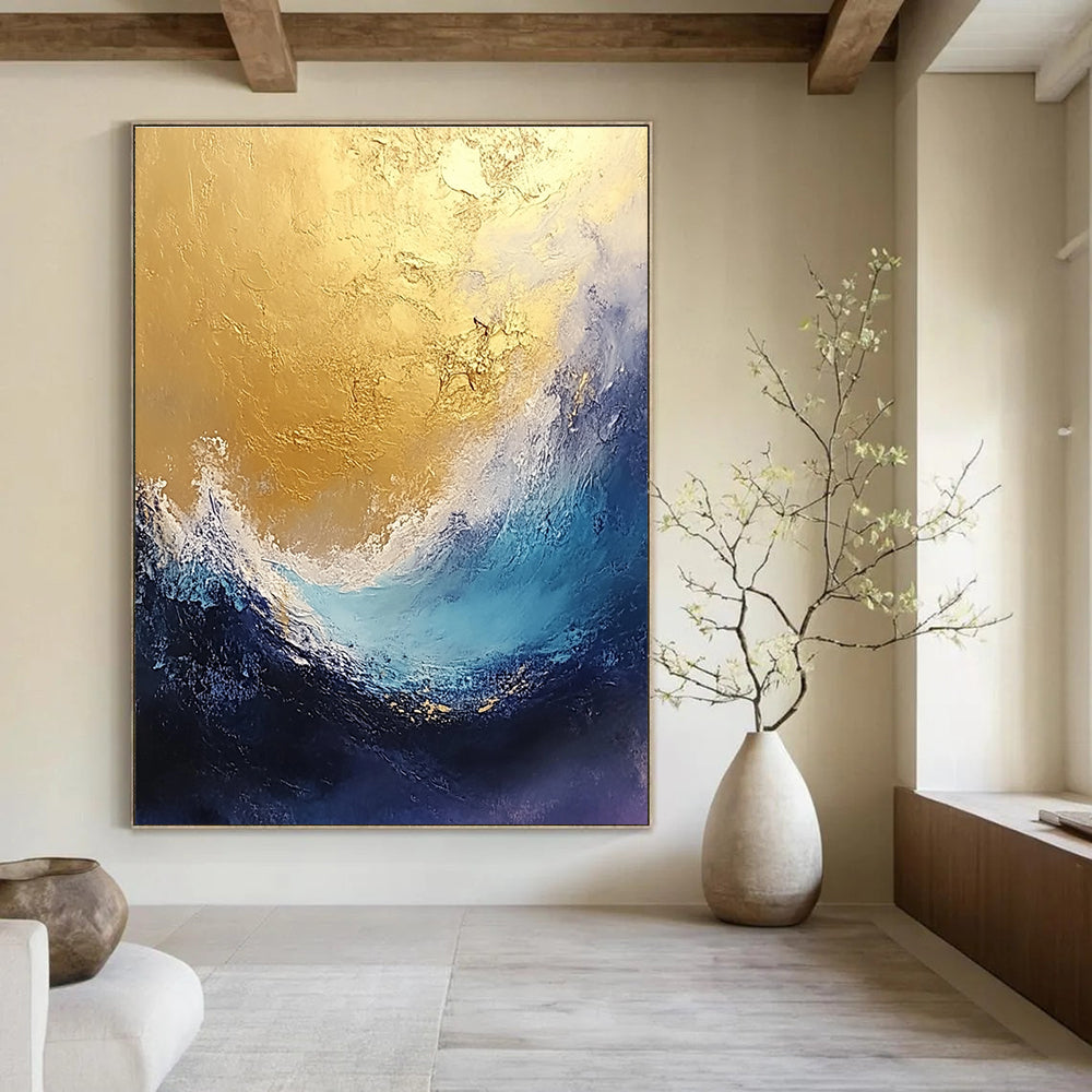 Large abstract painting depicting stormy seas in gold and blue tones with a textured finish perfect for enhancing any space.STSC334