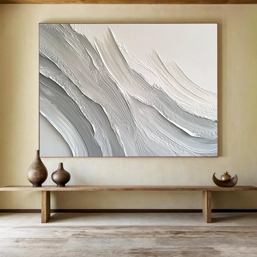 Large abstract painting featuring swirling white and gray patterns that create depth and texture against a plain background.SC451