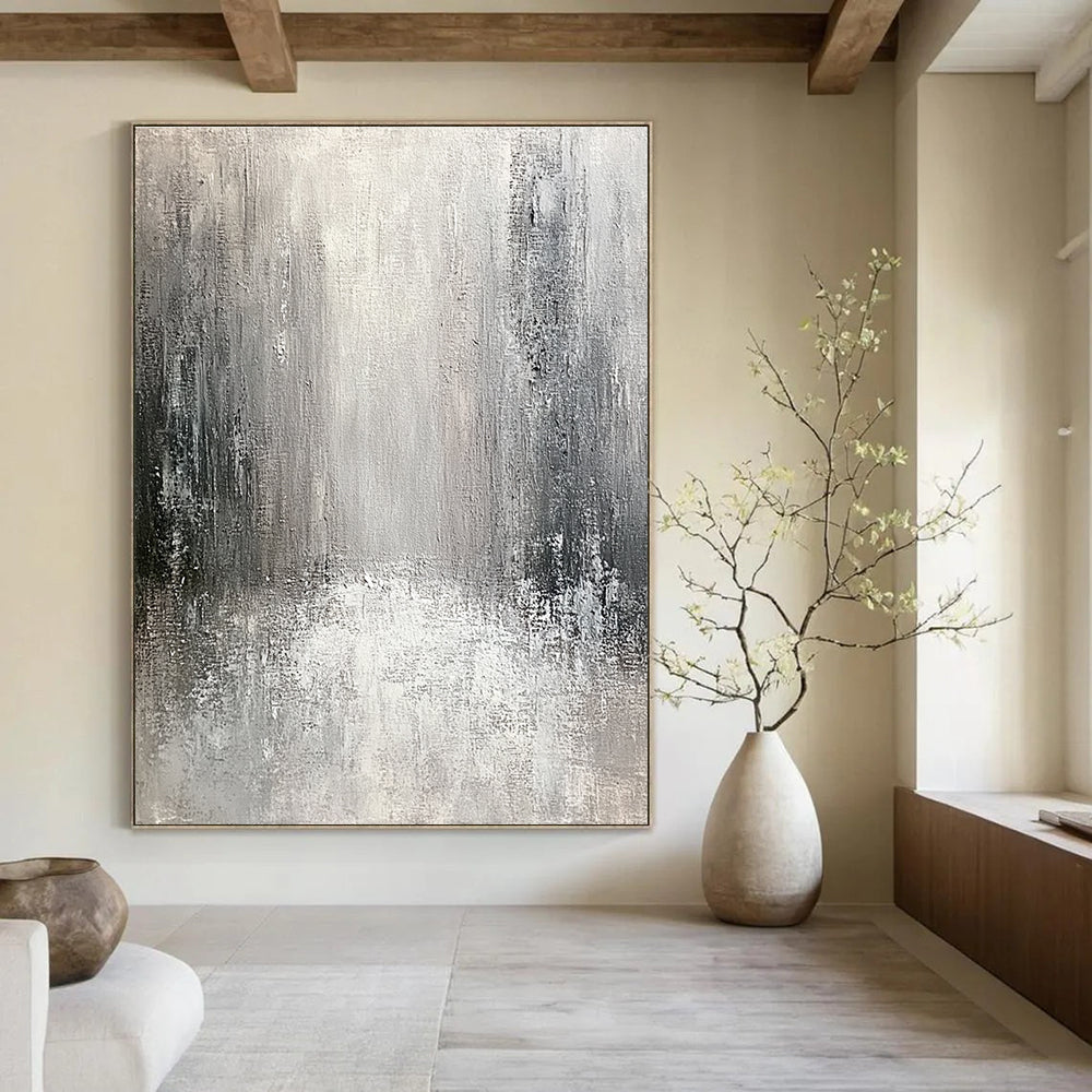 Large abstract painting of an old city featuring textured canvas in neutral tones with gray and white and silver accents creating an atmospheric perspective.STSC267