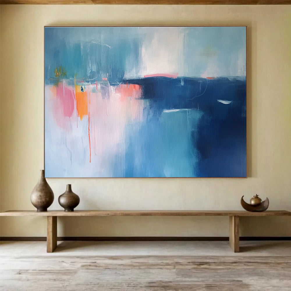 Large abstract painting featuring serene blue and pink tones with blurred edges and distant boats, evoking a minimalist coastal atmosphere.SC063