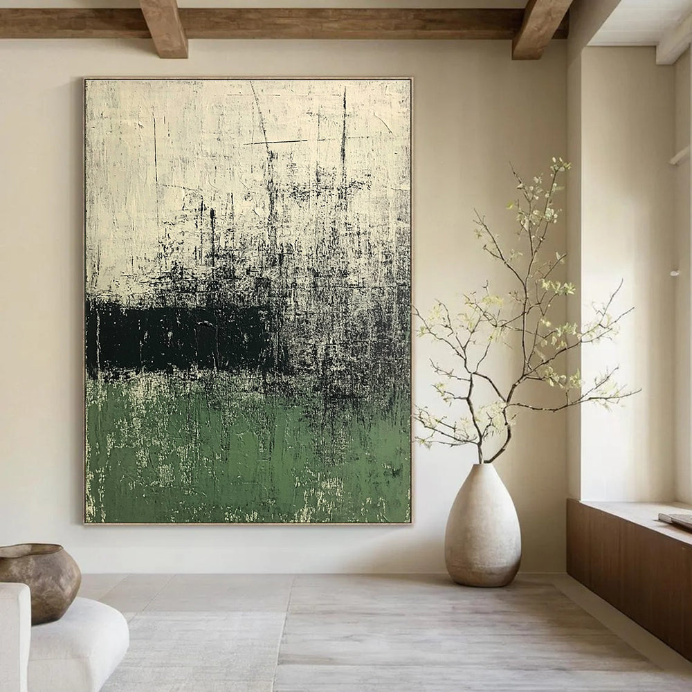 Large abstract painting in green and white tones with dark gray texture on old paper background evokes calmness and mystery through eroded and cracked surfaces.STSC423