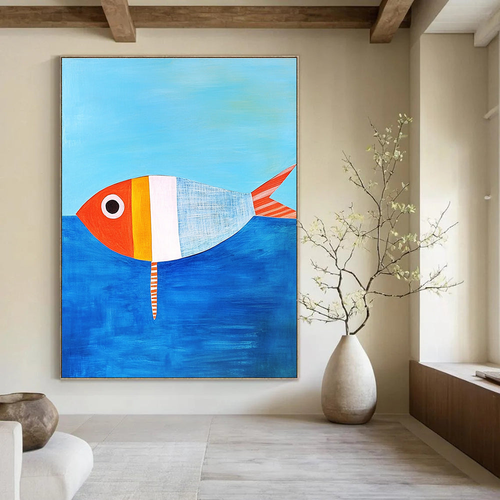 A large abstract painting featuring a simple paper fish in Matisse style against blue water with an orange and white striped tail.STSC1187