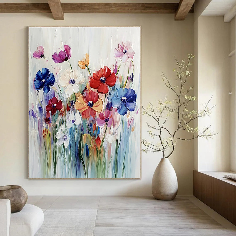 Large abstract painting of vibrant wildflowers in bold acrylic strokes against a soft white background capturing the essence of a colorful meadow.STSC993
