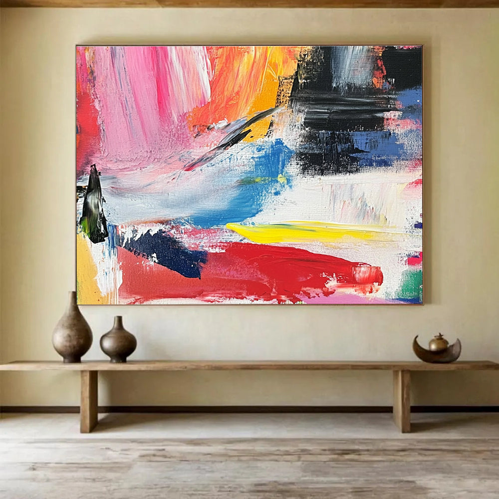 Abstract painting with vibrant colors and bold brush strokes evokes springtime joy and energy in a lively landscape of reds yellows and blues.SC437