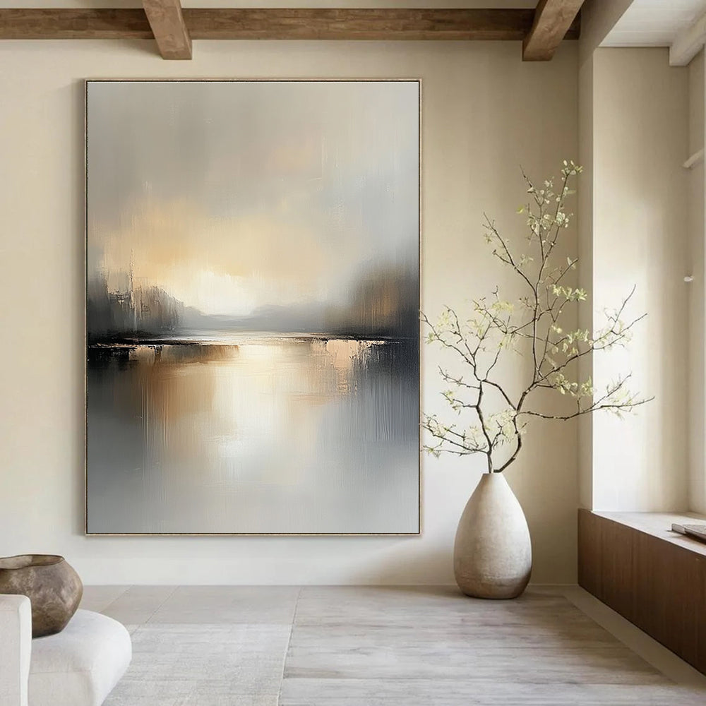 Large abstract landscape painting featuring a serene lake and soft gray beige tones capturing the tranquility of golden hour reflections.STSC084
