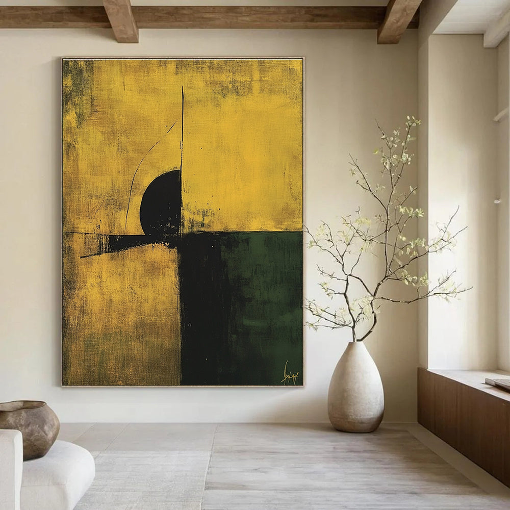Large abstract painting in minimalist style featuring earthy yellow and green tones with black accents and simple line composition.STSC246