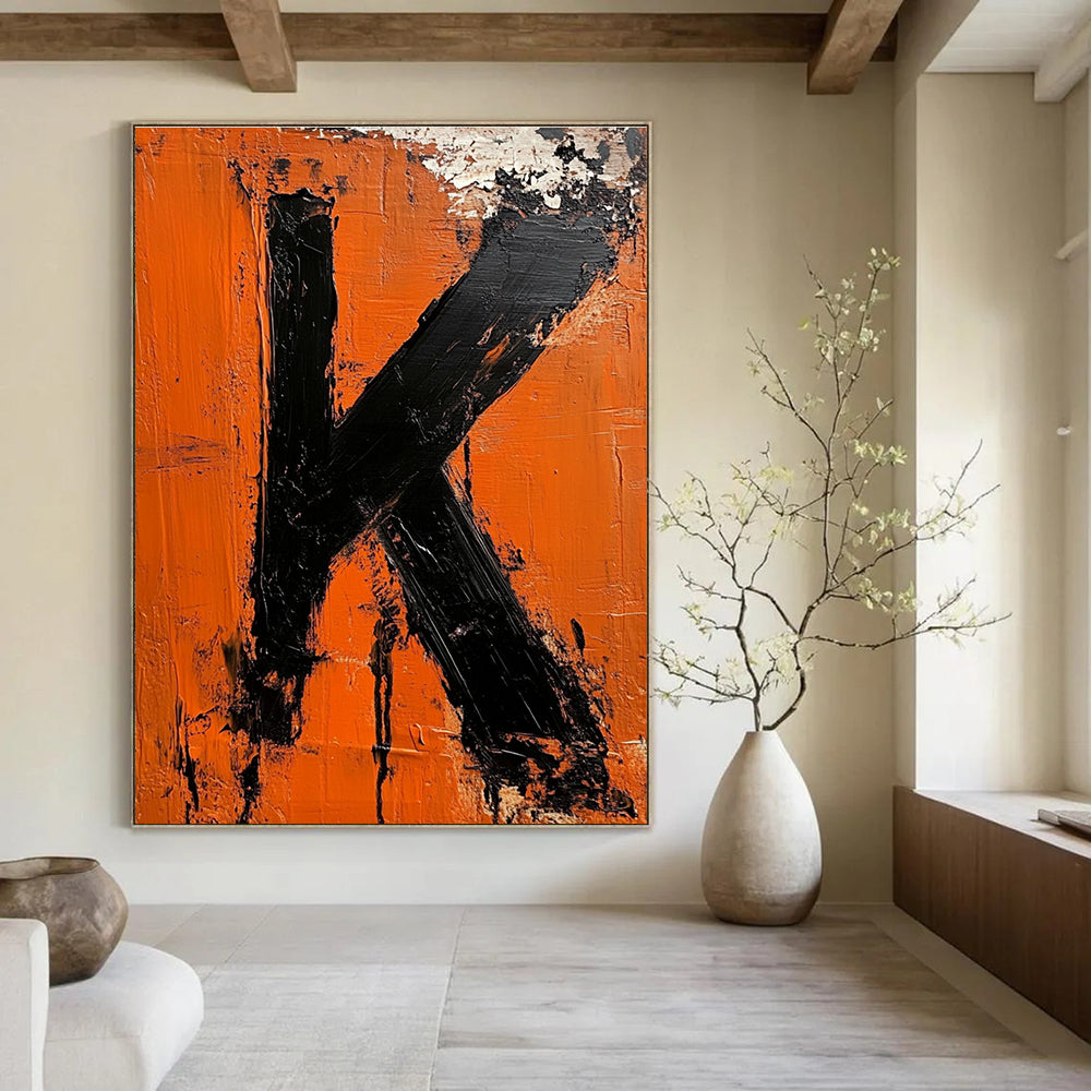 Large abstract impasto oil painting featuring the letter K in vibrant orange and black inspired by minimalist design.STSC1326