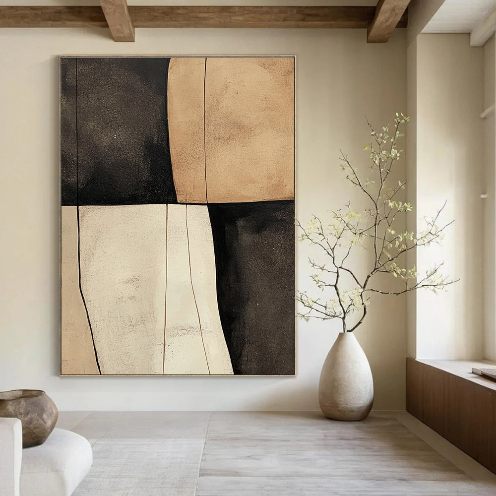 Large abstract painting featuring beige black and white shapes with smooth tan textures on a dark gray background.STSC627