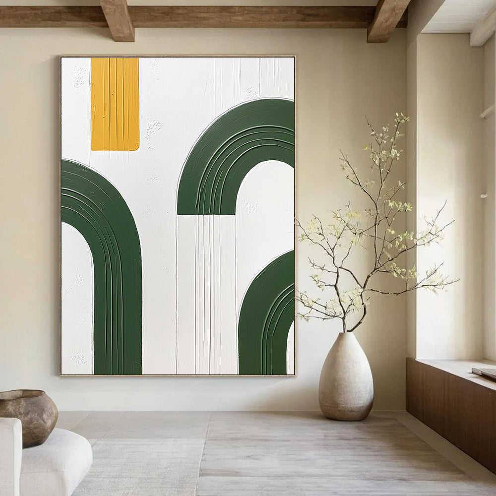 Large abstract painting featuring green arches and yellow circles on a white background with a hand-painted texture in oil paint.STSC1092