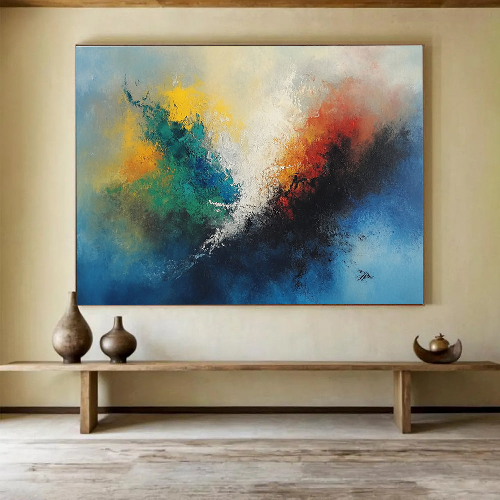 A large abstract painting featuring vibrant colors with a central fire-like figure and serene sky blue background.SC323
