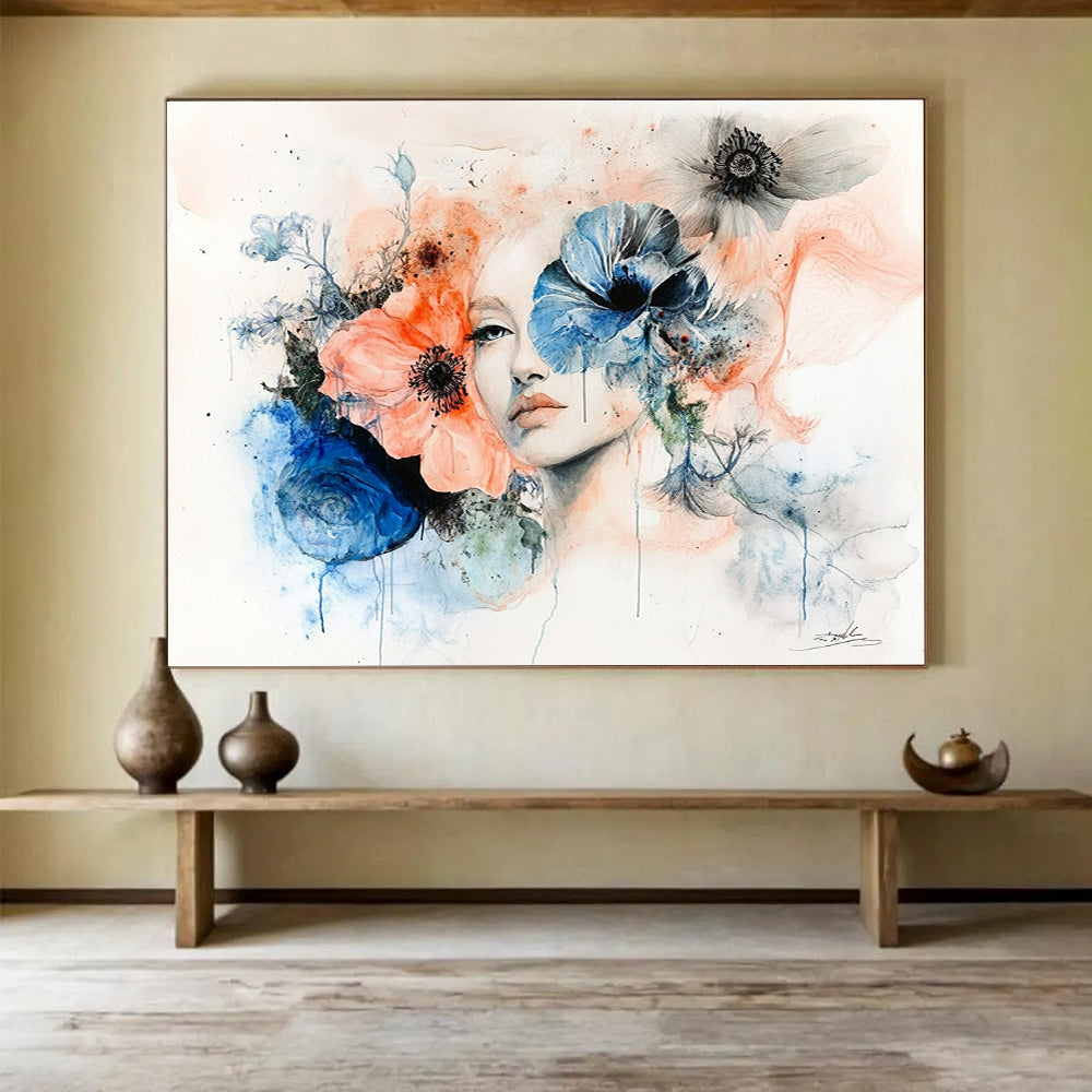 Large abstract painting featuring a woman's face framed by flowers in muted pastels of peach pink blue and grey on a white background.SC566