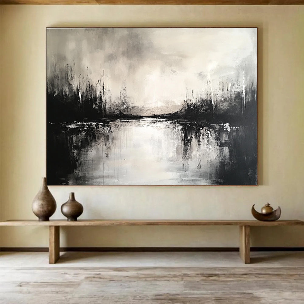 Large abstract painting featuring a black and white landscape with a serene lake and soft reflections, creating an atmospheric ambiance.SC011