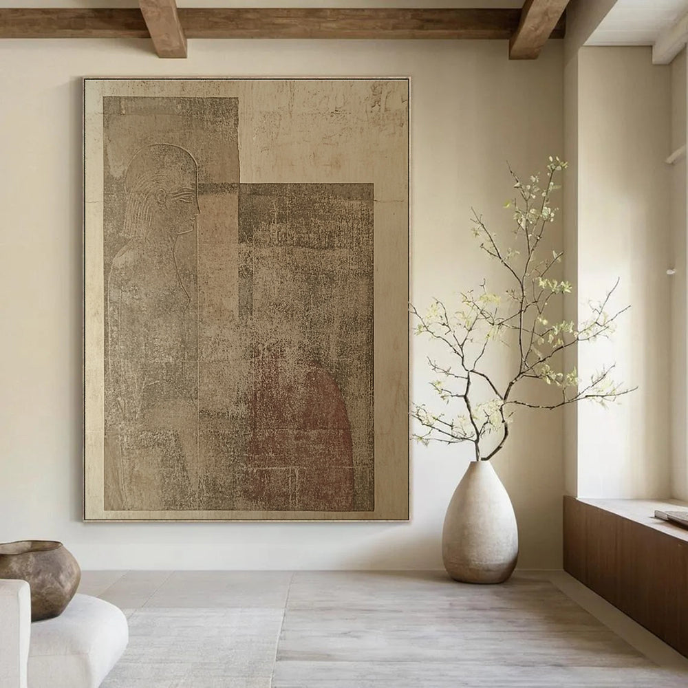 Large abstract artwork featuring ancient tablet carvings depicting two human figures against beige walls, showcasing unique artistic expression and historical intrigue.STSC1156