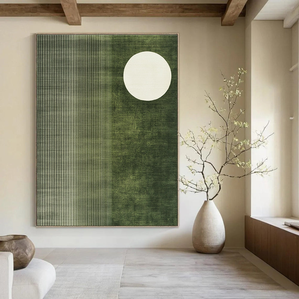 Abstract painting featuring a white circle on olive green fabric-like background with organic patterns and a white half-moon in the corner.STSC1251