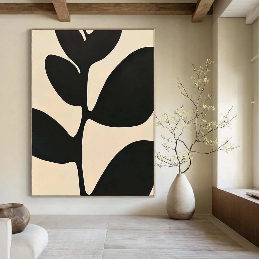 Large abstract painting featuring minimalist black and white leaves with high contrast against a simple background inspired by Matisse.STSC1080