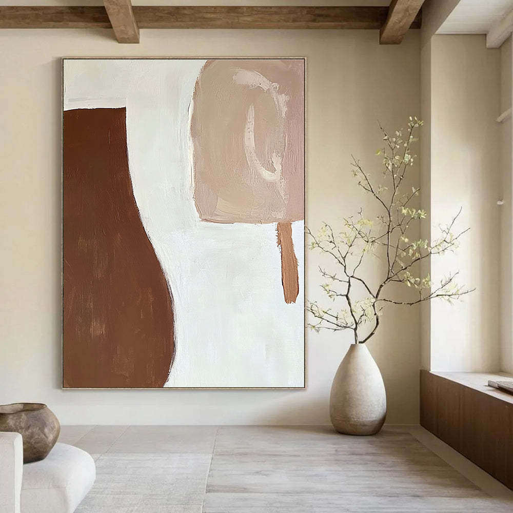 Large abstract painting featuring organic brown and white shapes with fluid brush strokes creating a calm serene atmosphere against a plain white background.STSC694