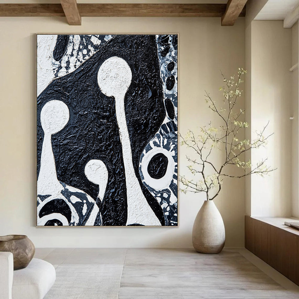 Large abstract painting featuring bold black and white patterns with tribal art elements and two figures holding musical instruments on textured canvas.STSC937