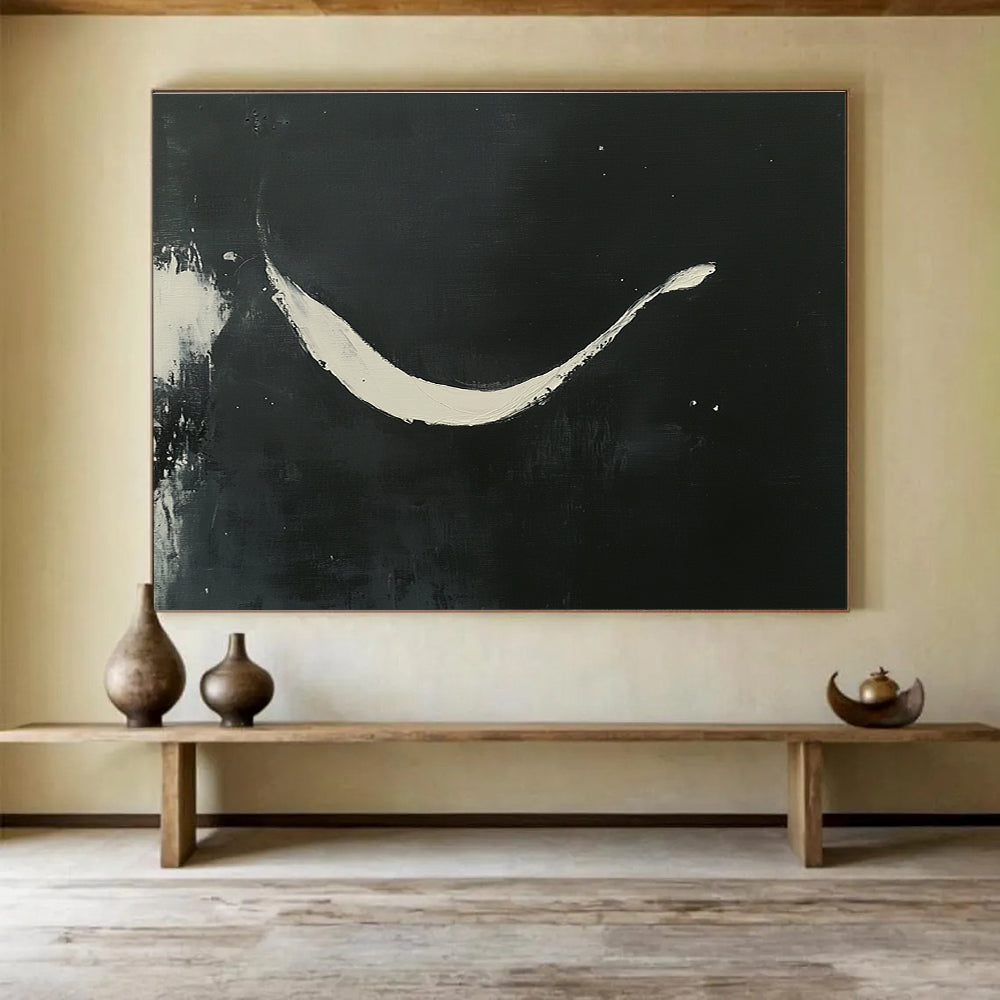 Large abstract painting featuring curved white brush strokes on a black background showcasing elegance and negative space in a minimalistic style.SC186