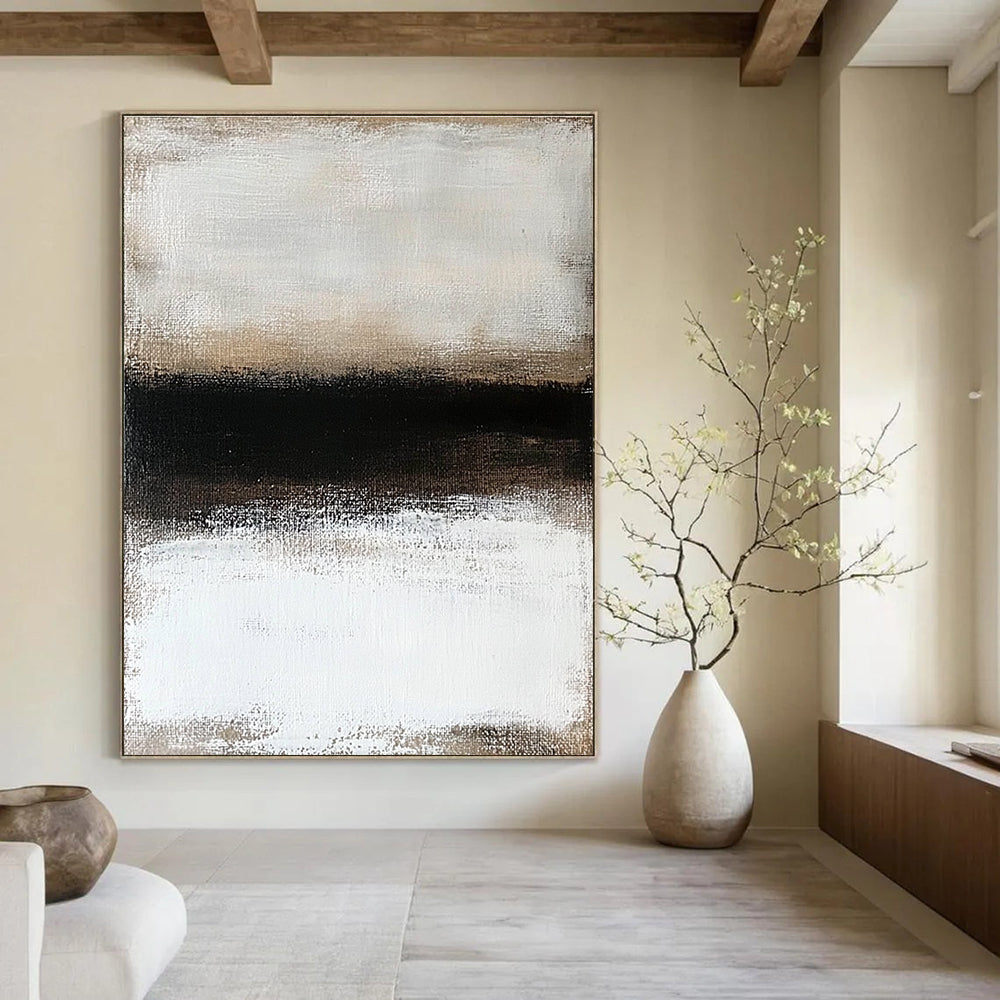 Large abstract painting featuring a textured surface of neutral colors depicting a snowy landscape enveloped in ethereal fog.STSC630