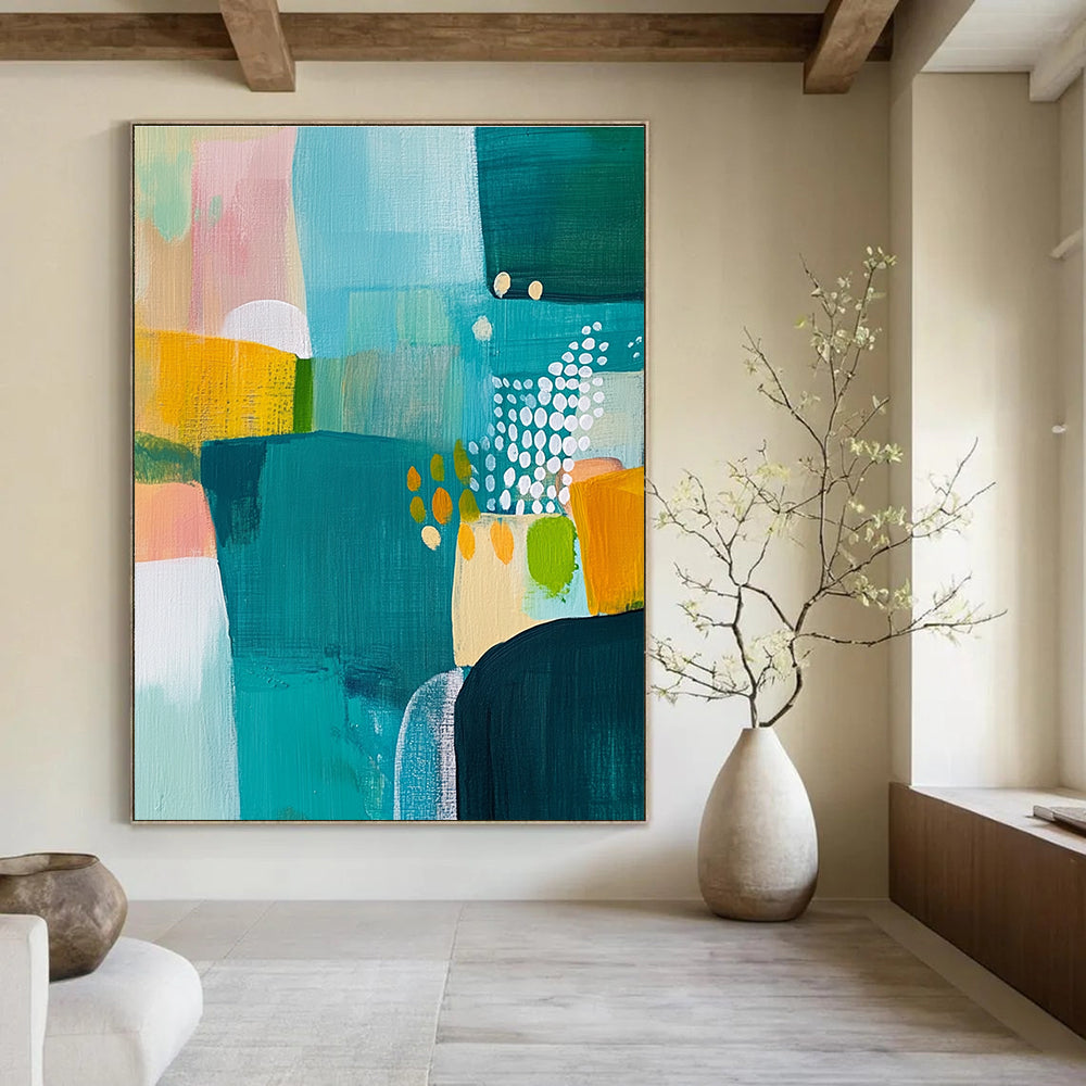 Large abstract painting featuring a landscape in teal yellow and green complemented by white dots and bold expressive brush strokes.STSC608