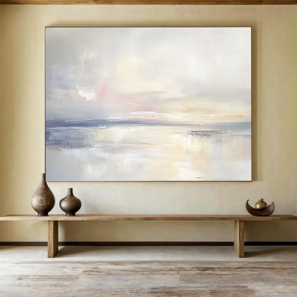 A large abstract painting featuring an open sky and gentle clouds in muted pastels, blending into serene waters for a tranquil ambiance.SC556
