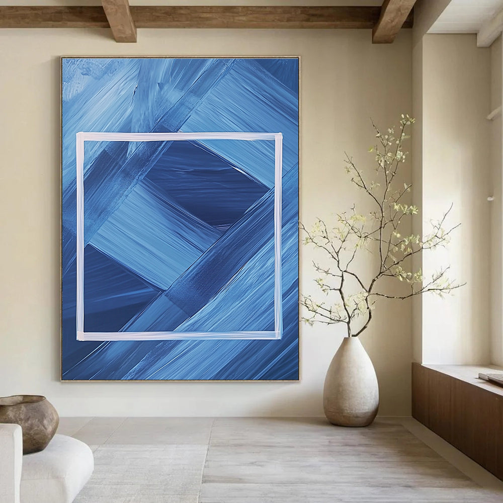Abstract painting featuring a dark blue background with a white frame and geometric shapes creating a symmetrical minimalist design.STSC037