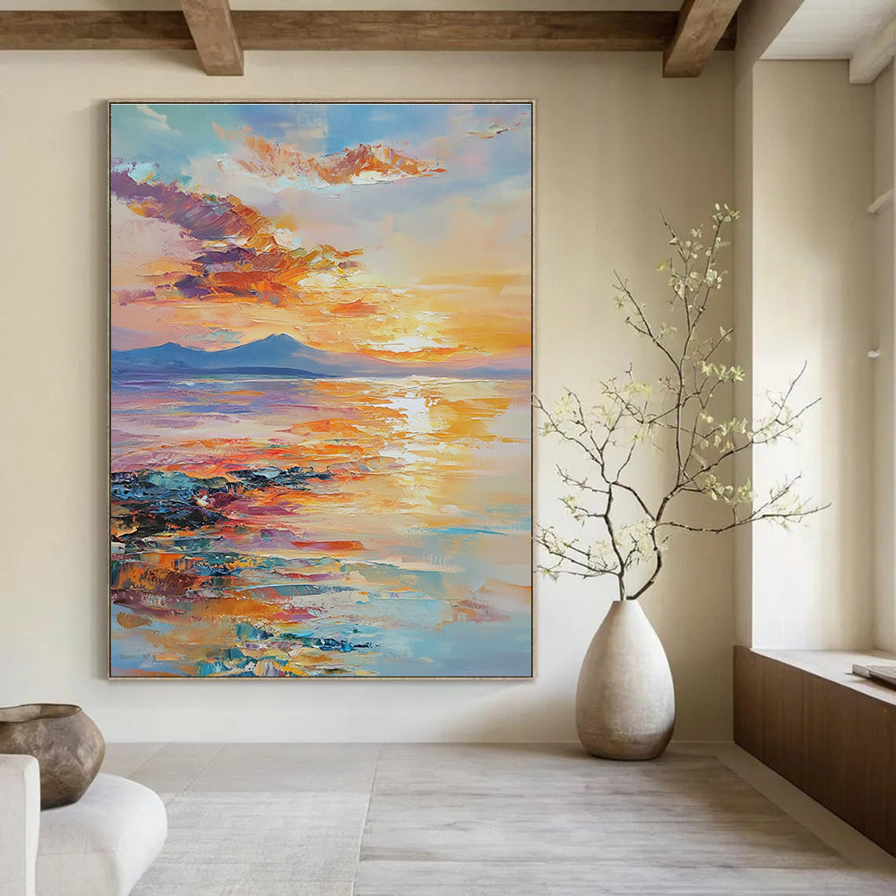 Large abstract painting of an ocean sunset with warm hues reflecting on water showcasing tranquility and nature's beauty in a dreamy atmosphere.STSC865