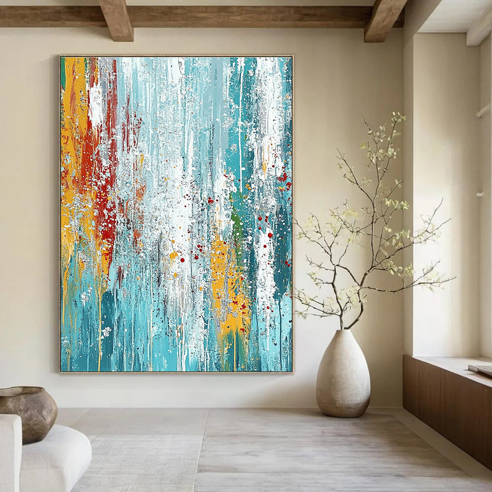 Large abstract painting on textured canvas featuring blue and teal hues with vibrant paint drips and dynamic brush strokes for an energetic feel.STSC719