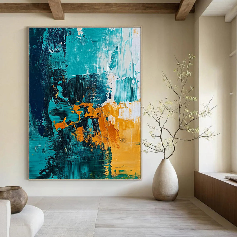 Large abstract painting of the ocean featuring teal and amber hues with expressive brush strokes for vibrant wall decor.STSC704