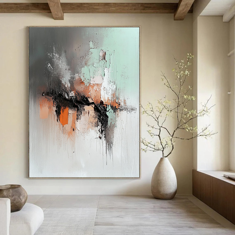 Large abstract painting featuring soft gray mint green and rust orange with a dark brown lava flow and a blurred silhouette walking away.STSC795