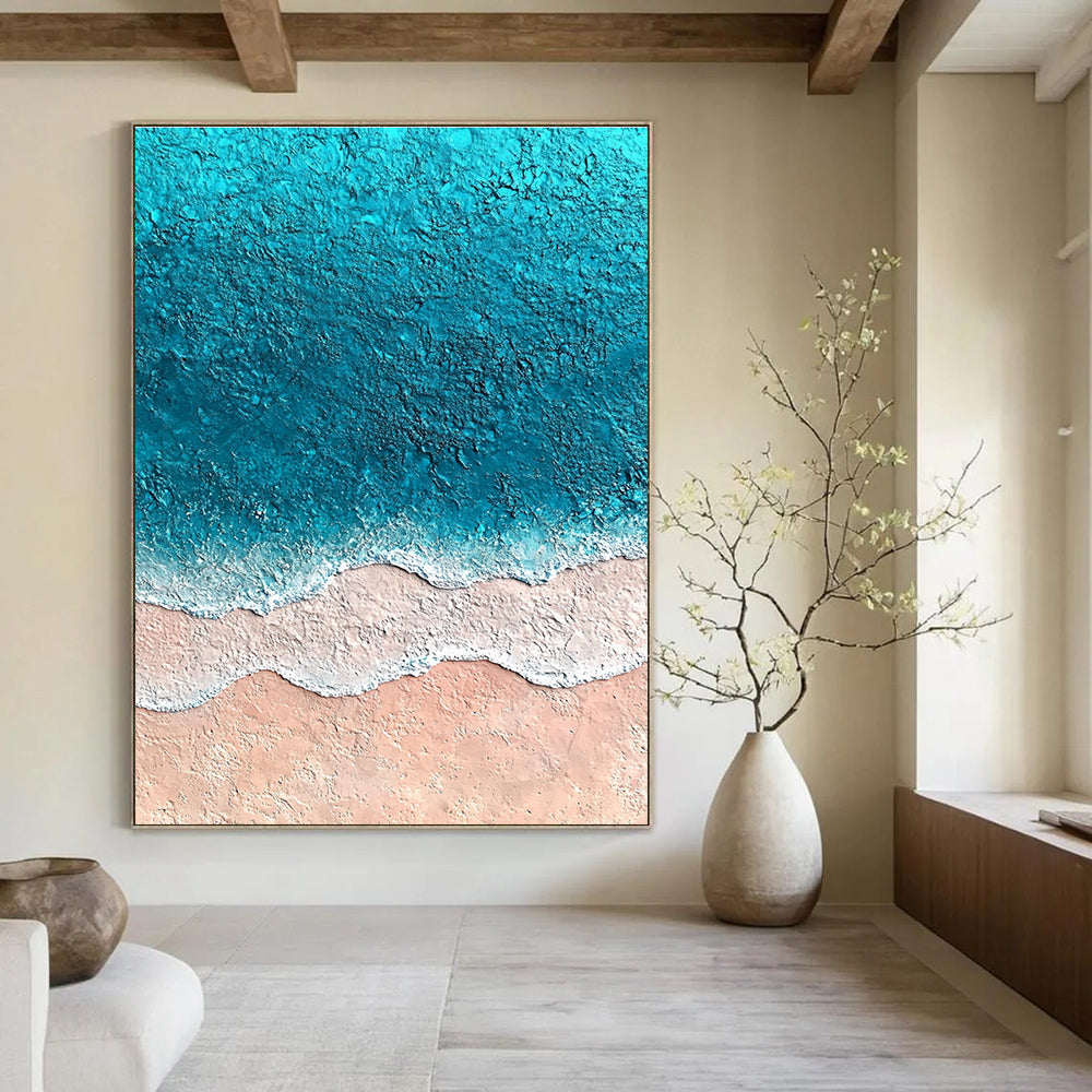 Large abstract painting featuring textured sand and vibrant blue sea with soft watercolor gradients creating an immersive oceanic experience.STSC1428