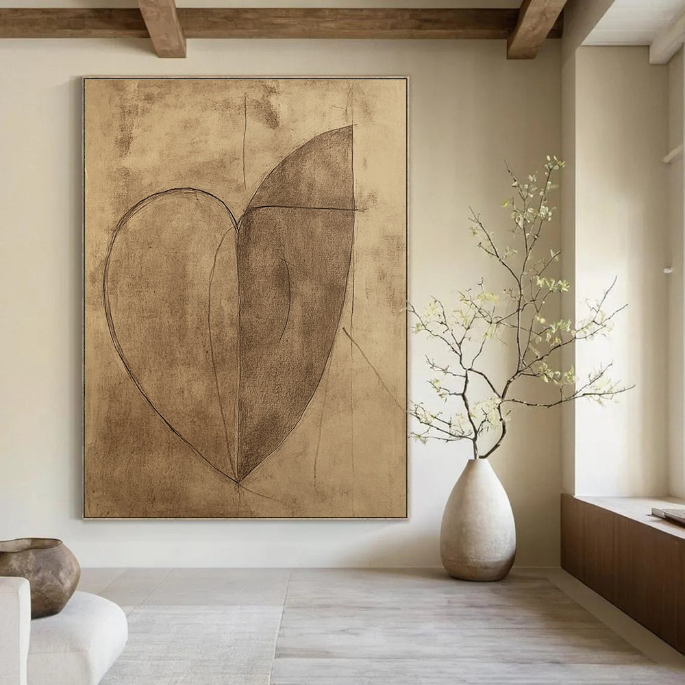 Large abstract heart drawing on brown paper featuring a continuous line shaped like a half-moon.STSC983