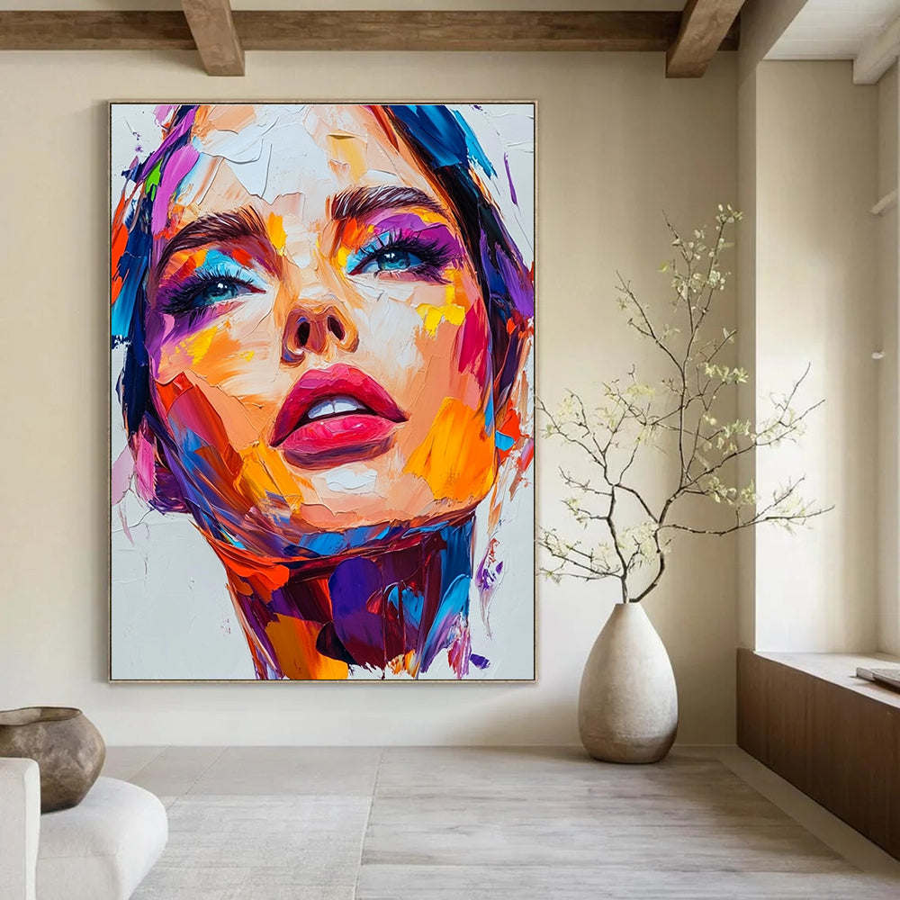An abstract painting featuring a close-up portrait of an attractive woman with vibrant colors and thick brush strokes on a white background.STSC1162