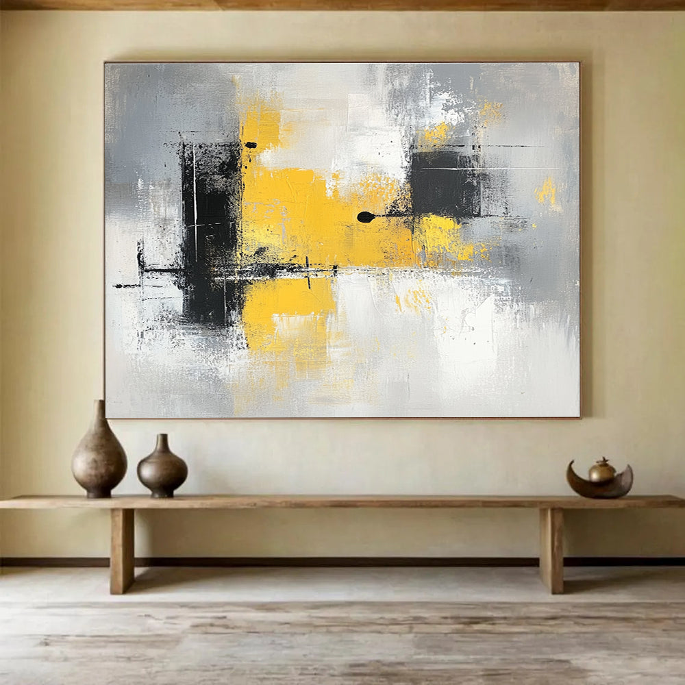 Large abstract painting with gray and yellow tones featuring blocks of color soft edges and delicate brushstrokes on a gray background.SC241