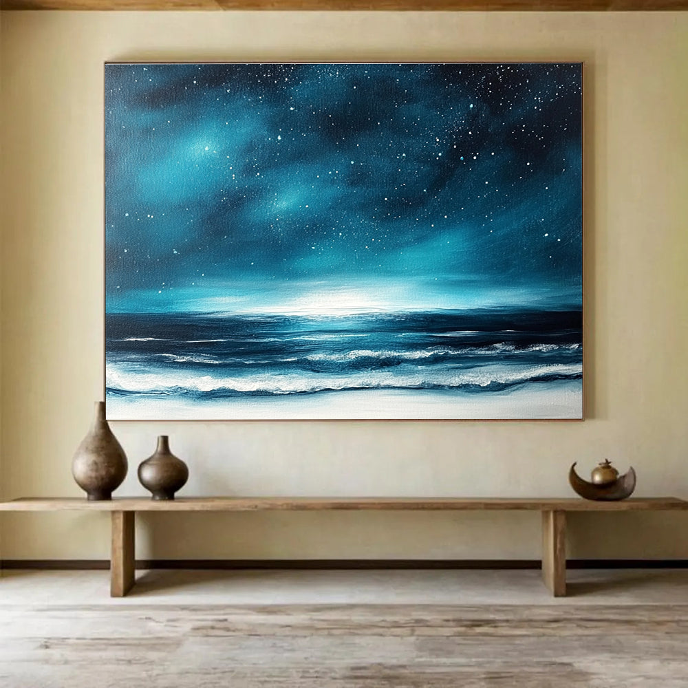 A large abstract painting featuring a dark blue sky with stars and ocean waves, accented with white and light teal hues.SC396