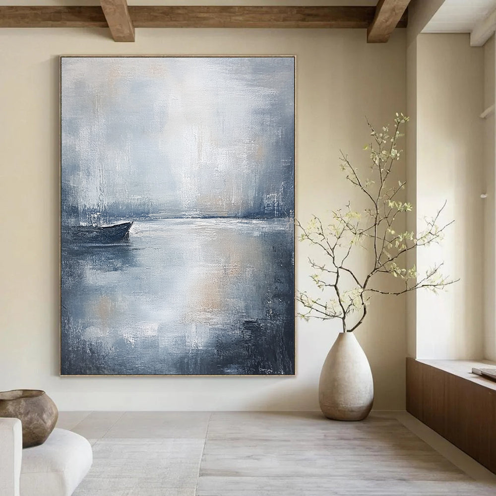 Large abstract painting in muted gray and white tones with soft brushstrokes evoking calmness and serenity perfect for any space.STSC044